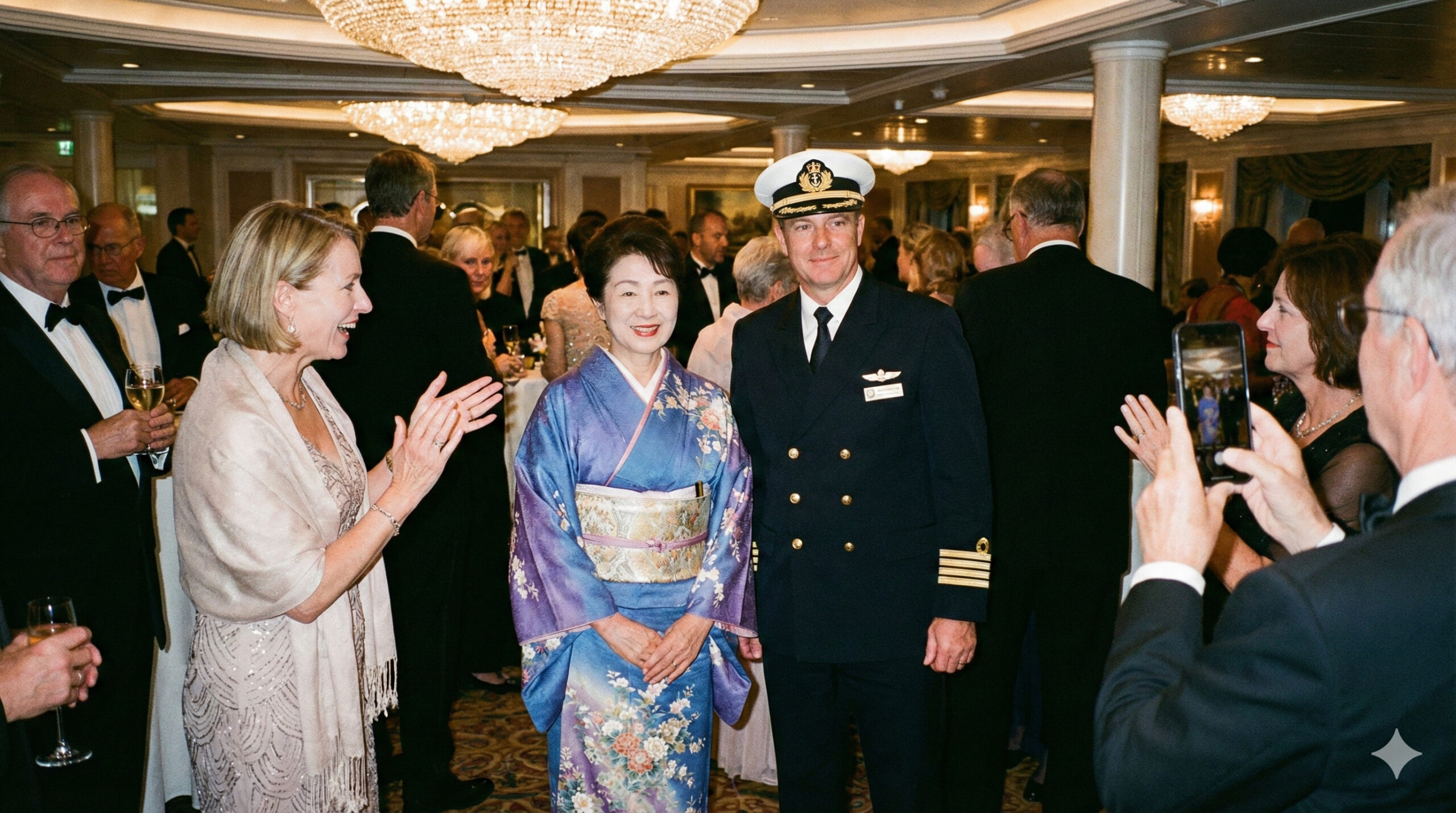 着物姿の女性が船長と記念撮影